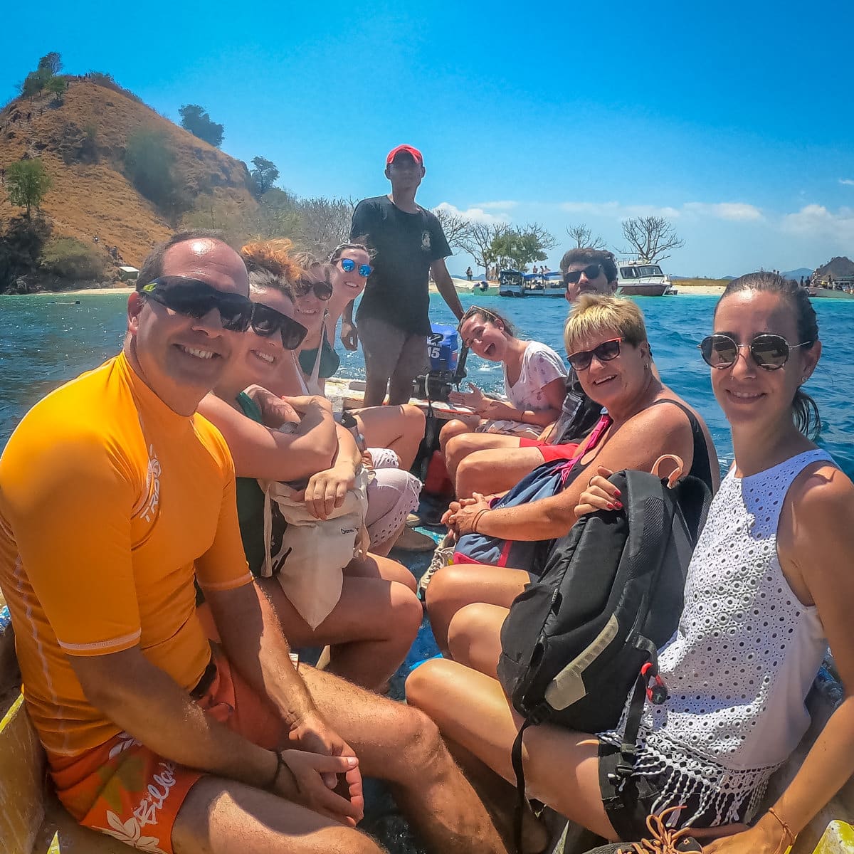 Komodo Island boat tour at Kelor with Clients Smiling